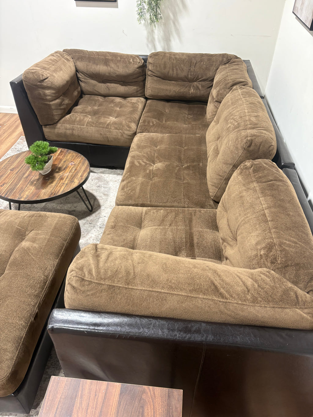 Brown Faux Leather Sectional with Fabric Cushions and Ottoman